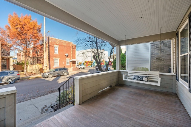 wooden deck with a porch