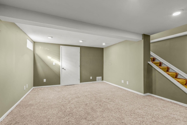 basement with carpet flooring