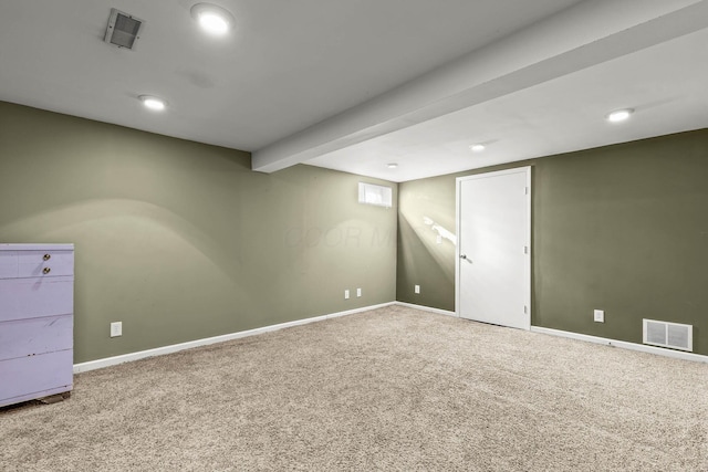 basement featuring carpet flooring