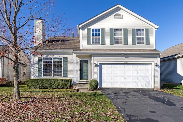 front of property featuring a garage