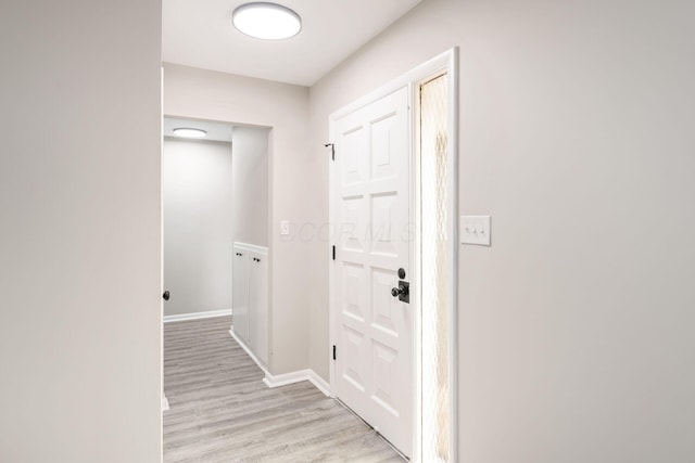 hall featuring light hardwood / wood-style floors