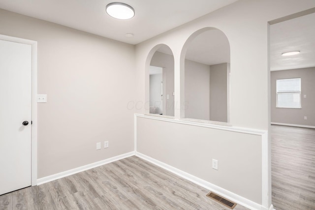 empty room with light wood-type flooring