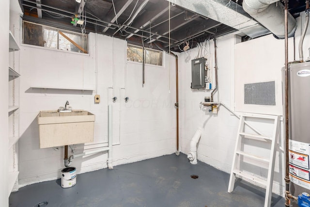 basement with gas water heater, sink, and electric panel