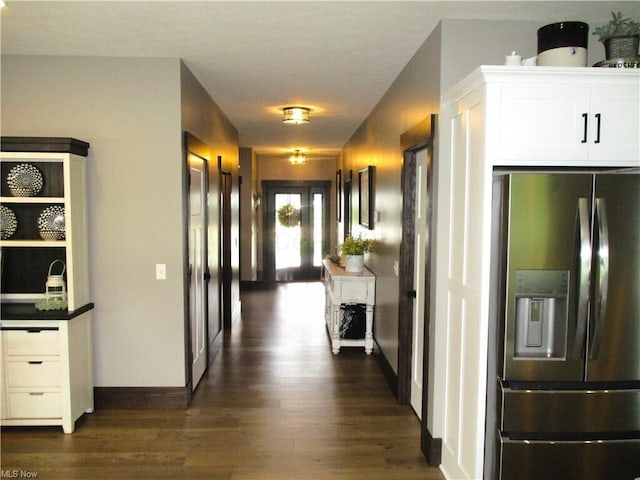 hallway with dark wood-type flooring