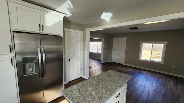 kitchen with white cabinetry, stainless steel fridge with ice dispenser, and dark wood-type flooring