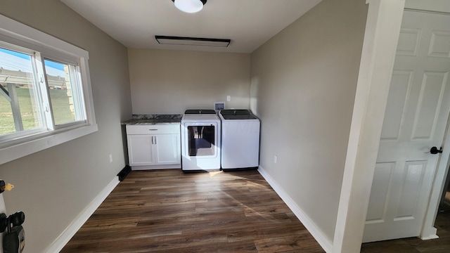 washroom featuring cabinets, dark hardwood / wood-style floors, and separate washer and dryer