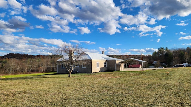 view of yard featuring a carport