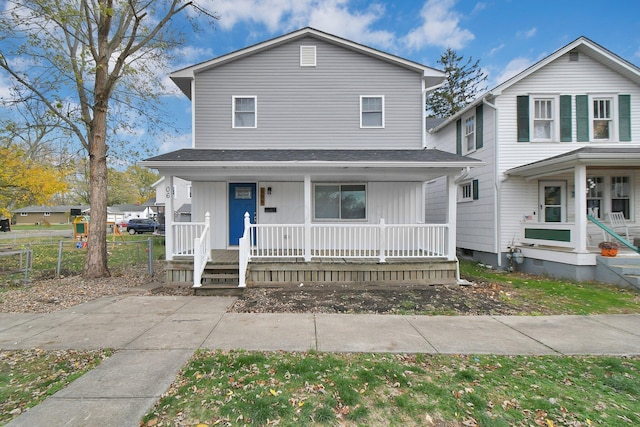 front of property featuring covered porch