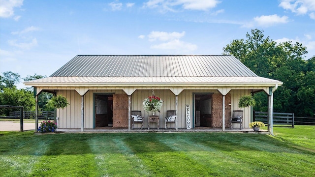 view of front of home with an outbuilding