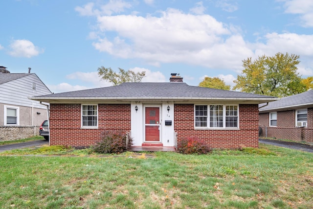 view of front facade featuring a front yard