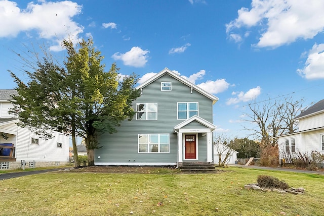 front of property featuring a front lawn