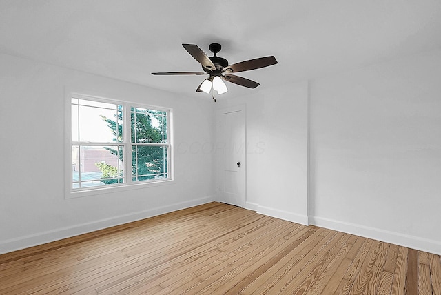 unfurnished room with light hardwood / wood-style flooring and ceiling fan