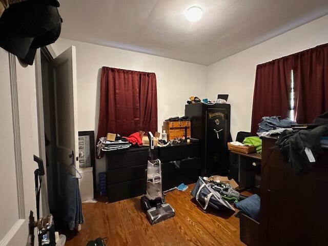 bedroom featuring hardwood / wood-style flooring