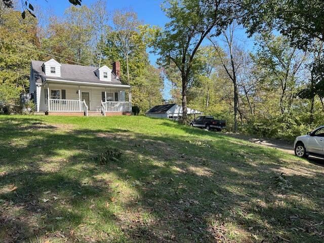 view of yard featuring a porch