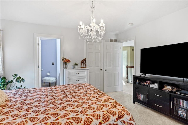 bedroom featuring light colored carpet, an inviting chandelier, and a closet