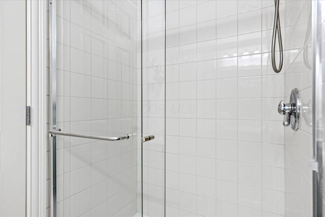 bathroom with an enclosed shower