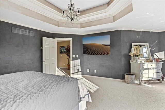 bedroom featuring a raised ceiling, crown molding, carpet flooring, and an inviting chandelier