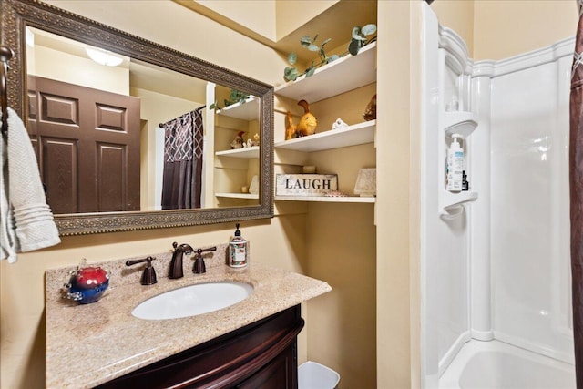 bathroom with vanity and shower / bath combo with shower curtain