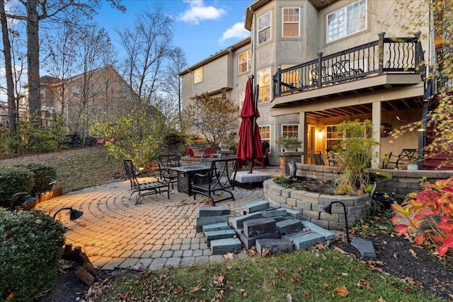 view of patio / terrace with a balcony