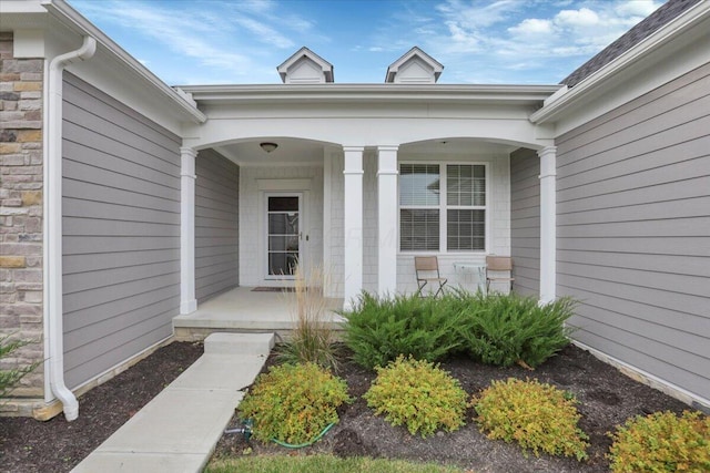 entrance to property with covered porch