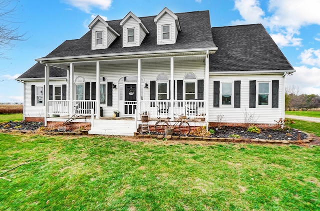 view of front of home with a front lawn and covered porch