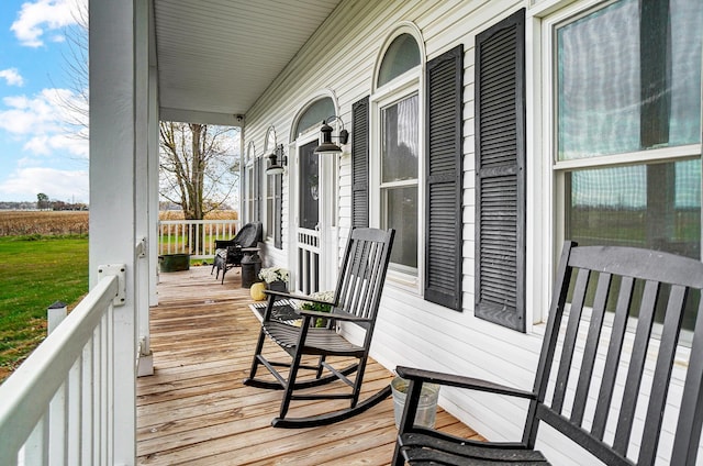 wooden terrace with covered porch