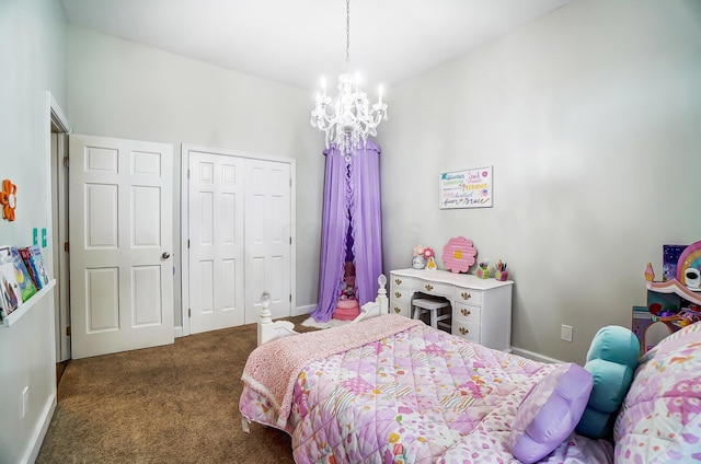 bedroom with a chandelier, a closet, and dark carpet