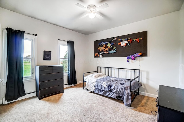 bedroom featuring carpet flooring and ceiling fan