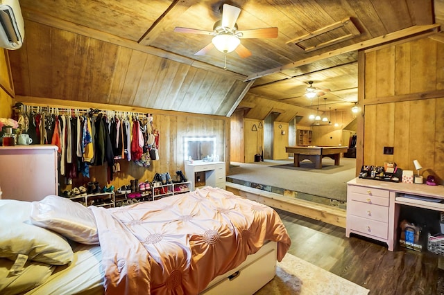 bedroom featuring a wall mounted air conditioner, wood walls, vaulted ceiling, dark hardwood / wood-style floors, and wood ceiling