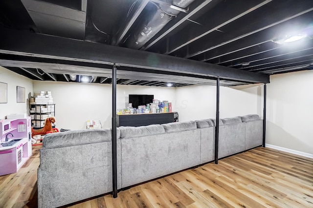 basement with wood-type flooring