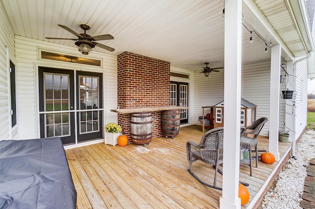 wooden terrace with ceiling fan