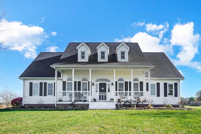 view of front facade with a porch and a front lawn