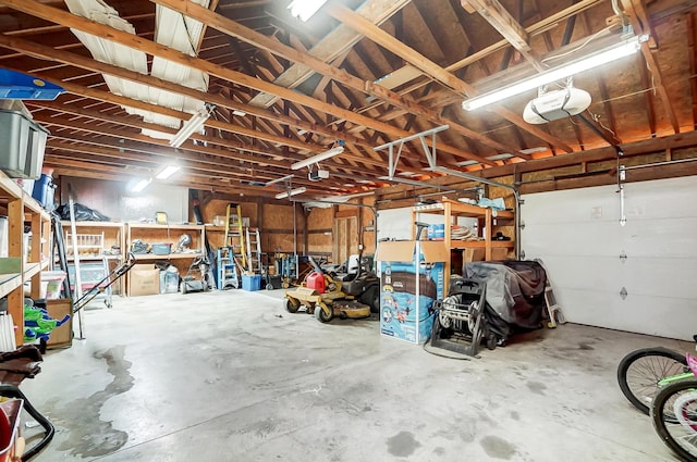 garage featuring a garage door opener