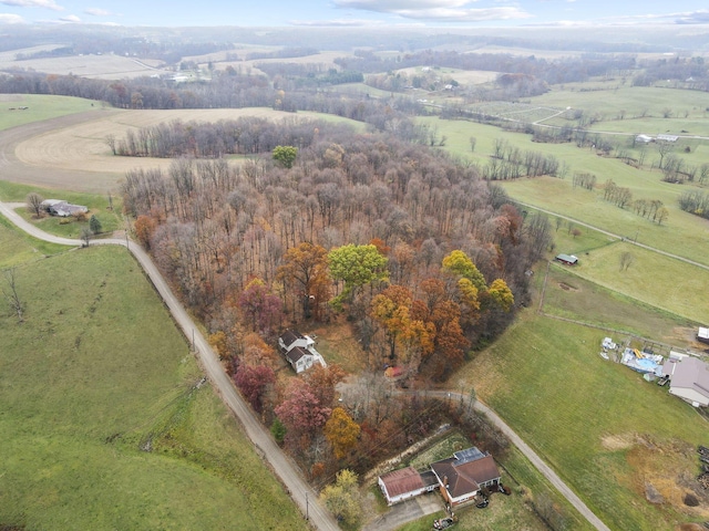 birds eye view of property featuring a rural view