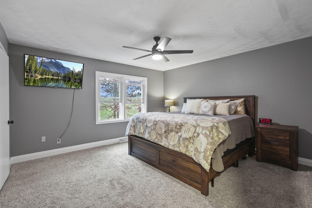 bedroom with ceiling fan and carpet