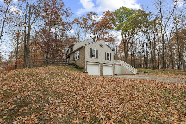 view of home's exterior with a garage