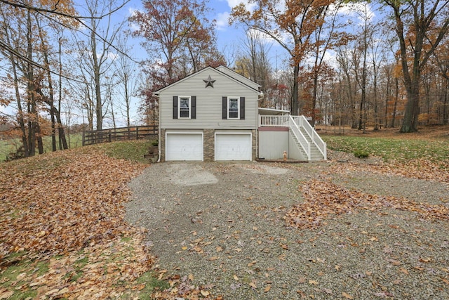 view of property exterior featuring a garage