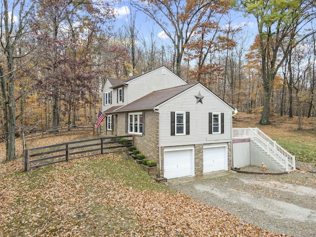 view of home's exterior with a garage