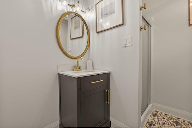 bathroom with vanity and an enclosed shower