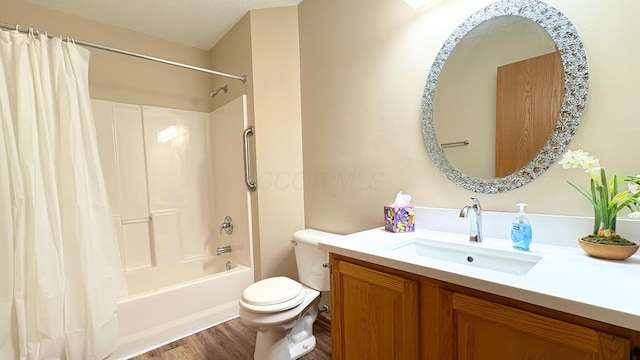 7837 Farmsbury Dr, Reynoldsburg, OH 43068 - full bathroom with vanity, shower / bathtub combination with curtain, toilet, and wood finished floors