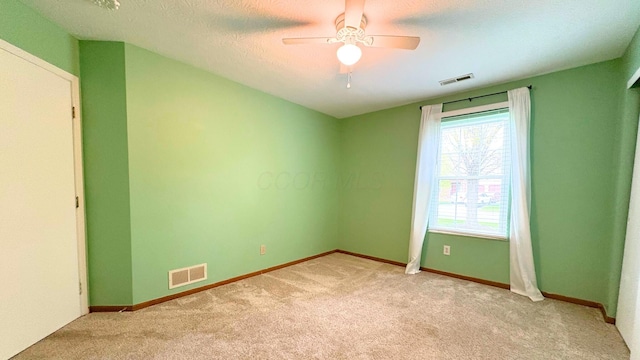 7837 Farmsbury Dr, Reynoldsburg, OH 43068 - empty room with baseboards, ceiling fan, light colored carpet, and visible vents