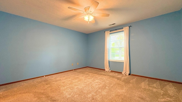 7837 Farmsbury Dr, Reynoldsburg, OH 43068 - empty room featuring visible vents, baseboards, ceiling fan, a textured ceiling, and carpet