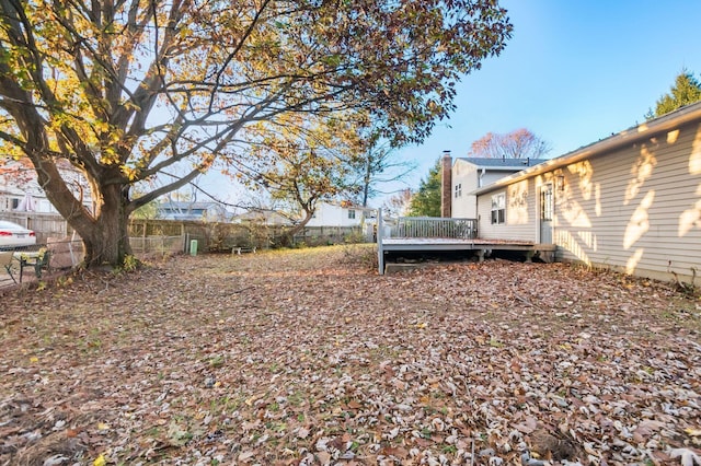 view of yard featuring a deck