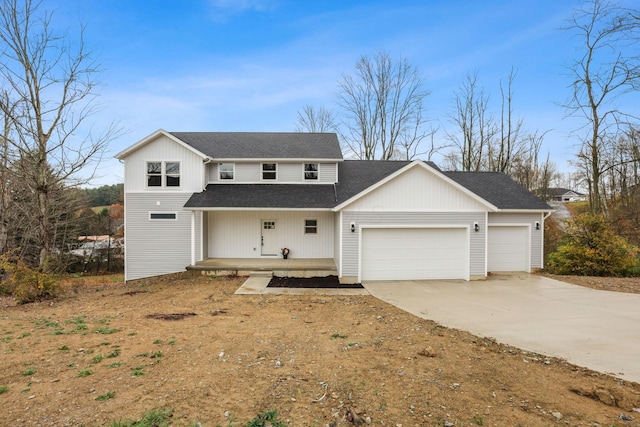 modern farmhouse with covered porch, driveway, roof with shingles, and a garage