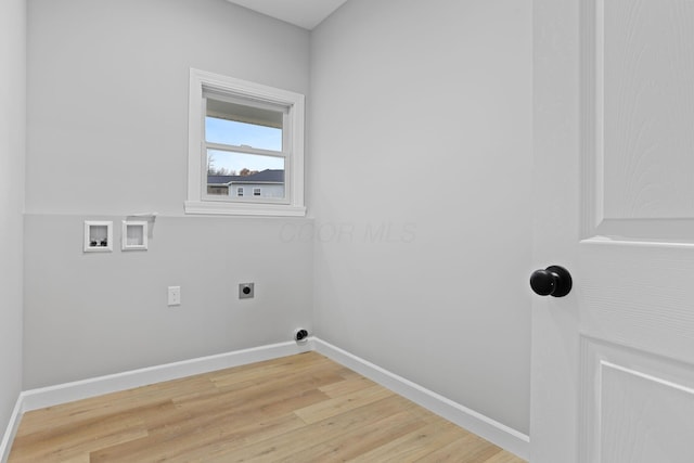 washroom with laundry area, baseboards, hookup for a washing machine, hookup for an electric dryer, and light wood-type flooring