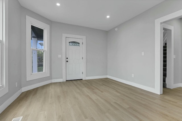 foyer with light hardwood / wood-style flooring