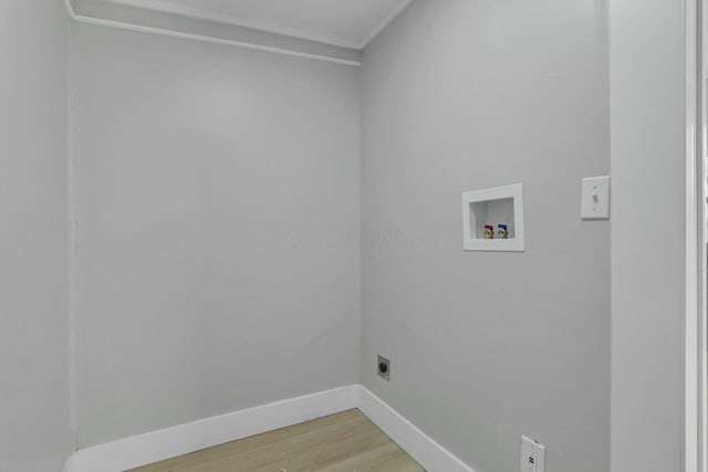 washroom with hookup for an electric dryer, wood-type flooring, and hookup for a washing machine