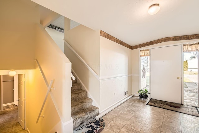 foyer entrance featuring plenty of natural light