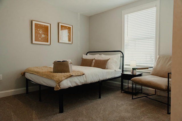 317 Johnson St, Columbus, OH 43203 - carpeted bedroom featuring baseboards
