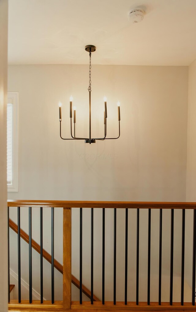 317 Johnson St, Columbus, OH 43203 - detailed view of a chandelier and a smoke detector